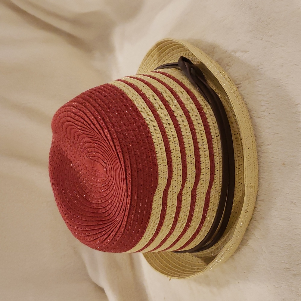 Tan and red straw brimmed hat by Calvin Klein, 7 1/2" across opening